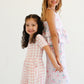 Falling for Luxe- Bubblegum Check Romper